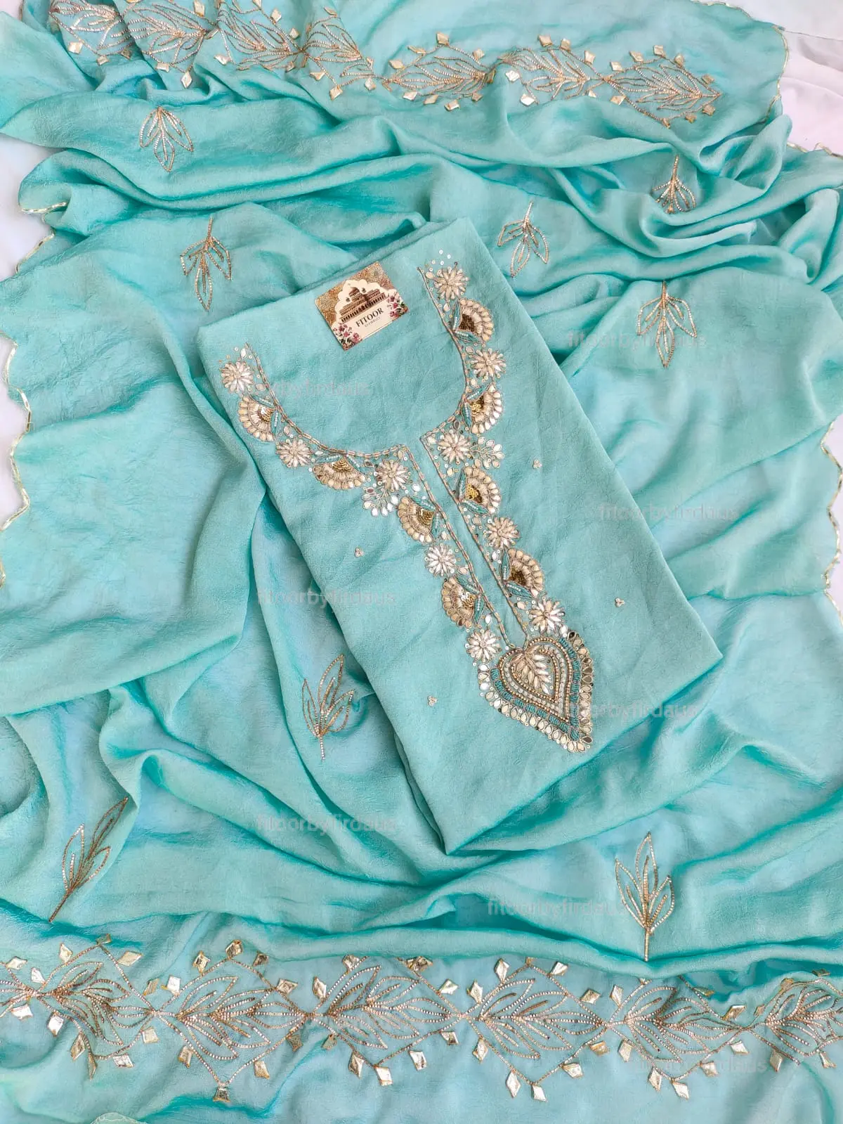 Moss crepe suit set with Zardozi, mirror, gota patti handwork and work dupatta